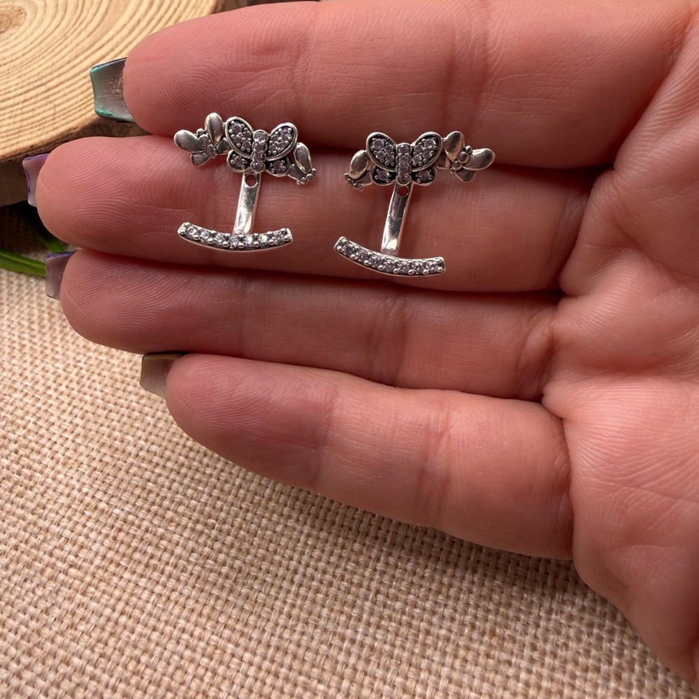 Second hand 🤚 Retired Pandora Silver Bow Earrings with Rhinestones